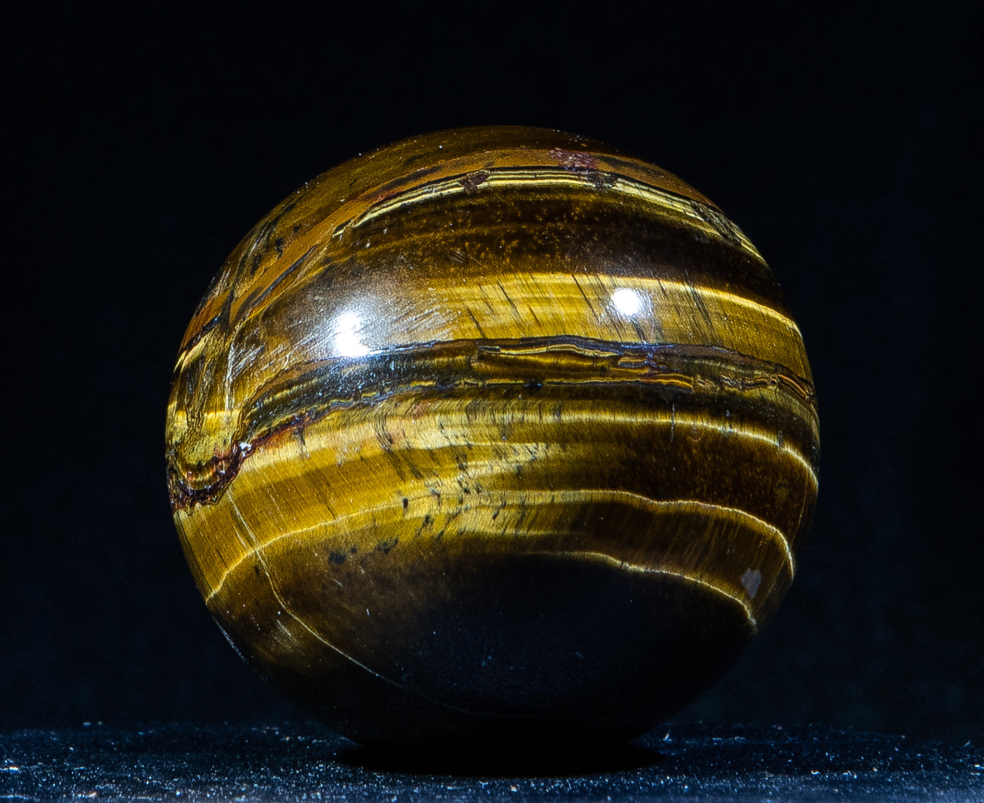 223 Tigers Eye Sphere 111 g 2x5.5in